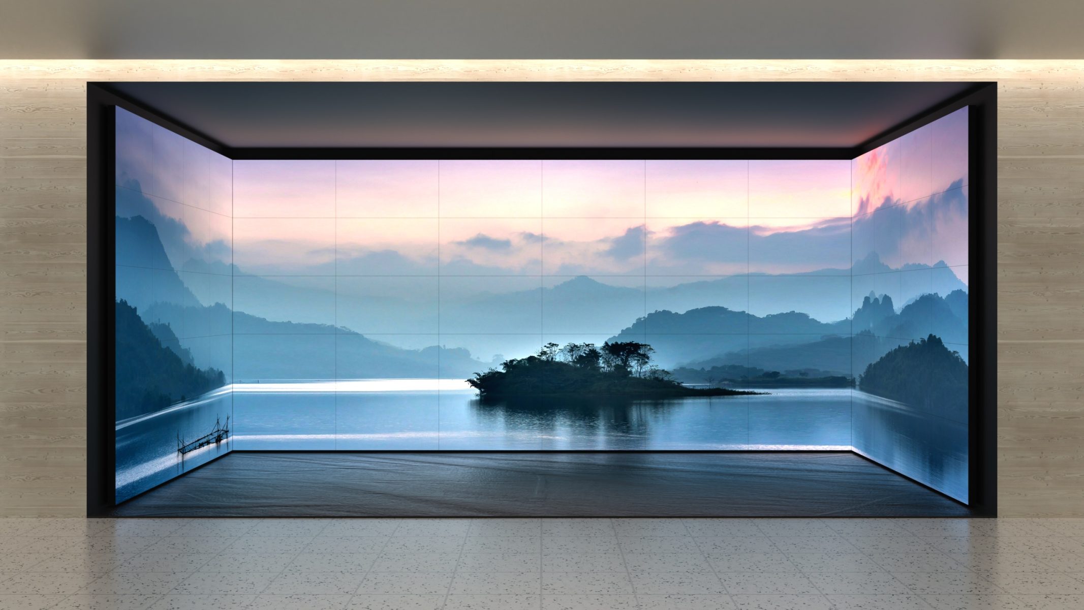 Large video wall displaying a scenic landscape with mountains and a lake, creating an immersive visual experience.